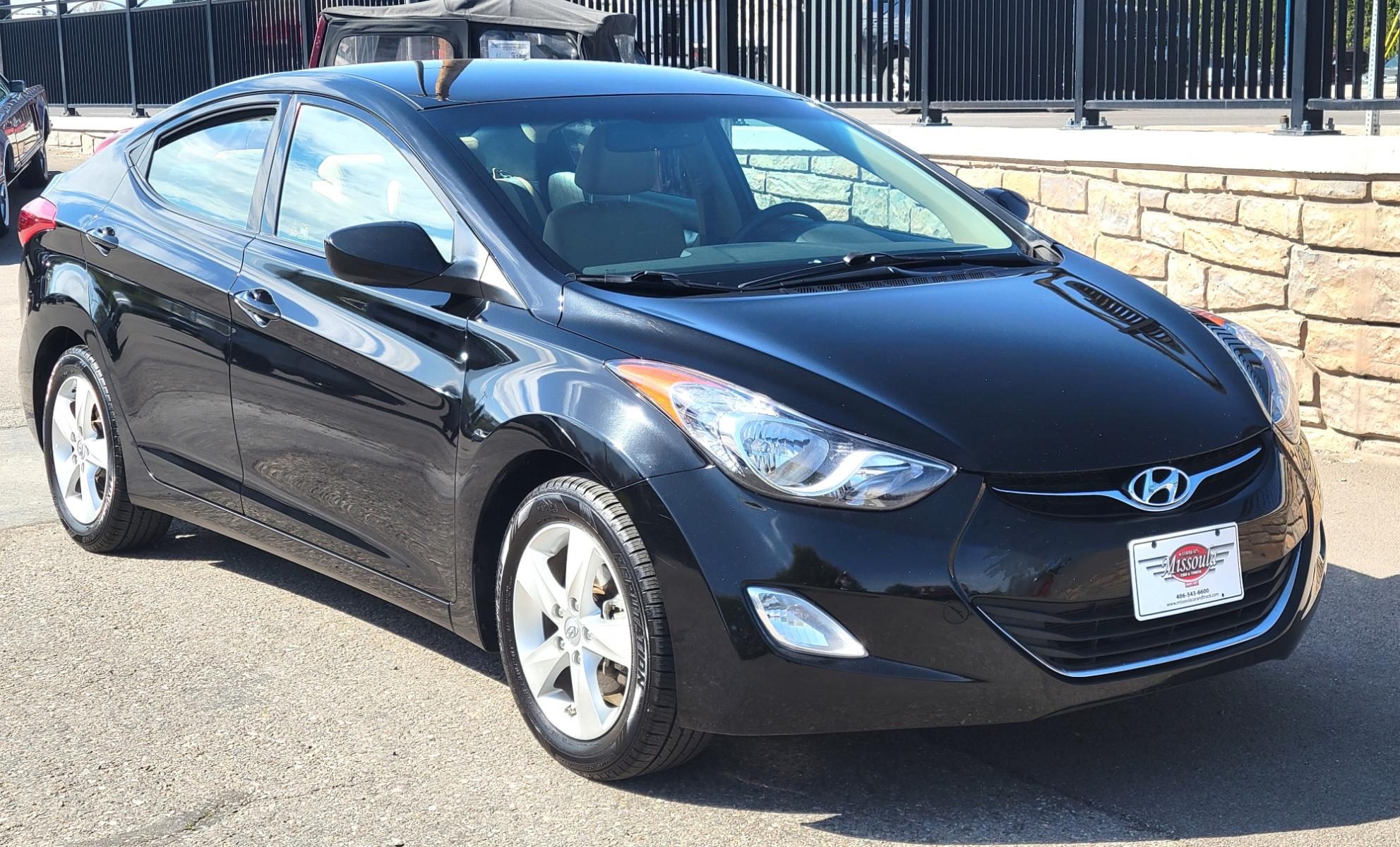 2013 Black /Tan Hyundai Elantra GLS (KMHDH4AE8DU) with an 1.8L I4 engine, 6 Speed Auto transmission, located at 450 N Russell, Missoula, MT, 59801, (406) 543-6600, 46.874496, -114.017433 - Low Mile Front Wheel Drive Sedan. One Owner. Excellent Fuel Economy. 1.8L I4 Engine. 6 Speed Automatic Transmission. AirConditioning. Power Windows and Locks. Bluetooth. - Photo #3